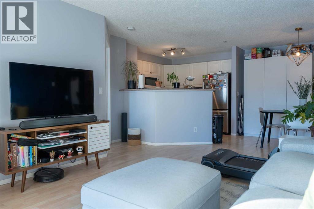206, 2000 Citadel Meadow Point Nw, Calgary, AB - Indoor Photo Showing Living Room