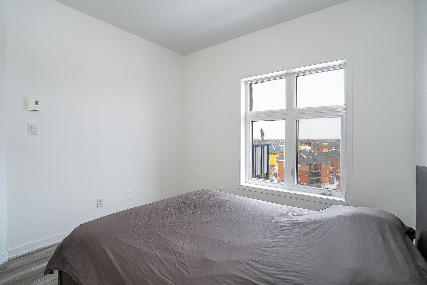 Chambre à coucher - 702-9185 Rue Lennon, Brossard, QC - Indoor Photo Showing Bedroom