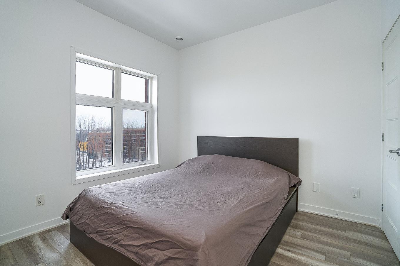 Chambre à coucher - 702-9185 Rue Lennon, Brossard, QC - Indoor Photo Showing Bedroom