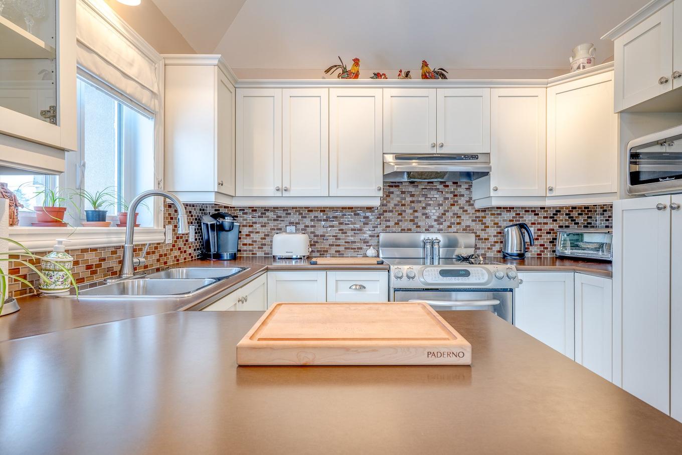 Kitchen - 401-2460 Boul. Lafontaine, Saint-Jérôme, QC - Indoor Photo Showing Kitchen With Double Sink