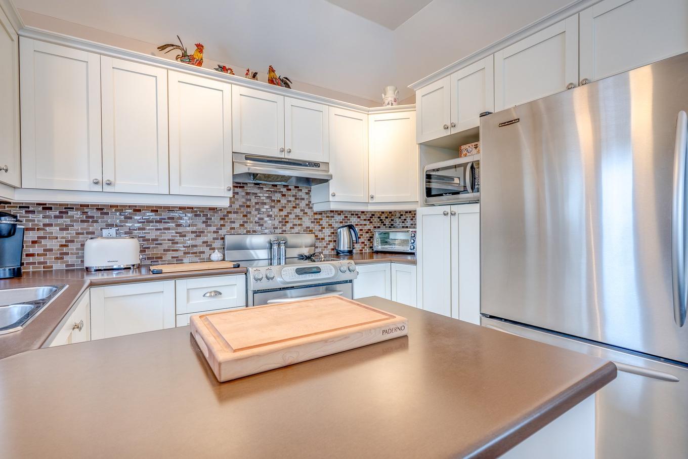 Kitchen - 401-2460 Boul. Lafontaine, Saint-Jérôme, QC - Indoor Photo Showing Kitchen