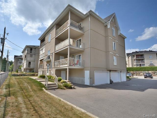 Garage - 401-2460 Boul. Lafontaine, Saint-Jérôme, QC - Outdoor