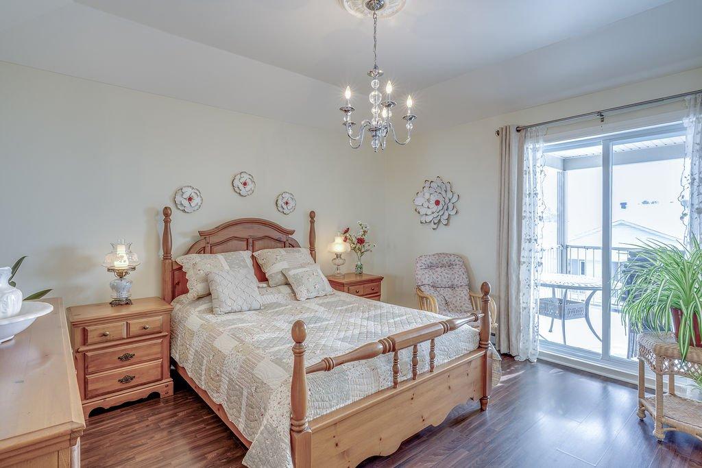 Primary bedroom - 401-2460 Boul. Lafontaine, Saint-Jérôme, QC - Indoor Photo Showing Bedroom
