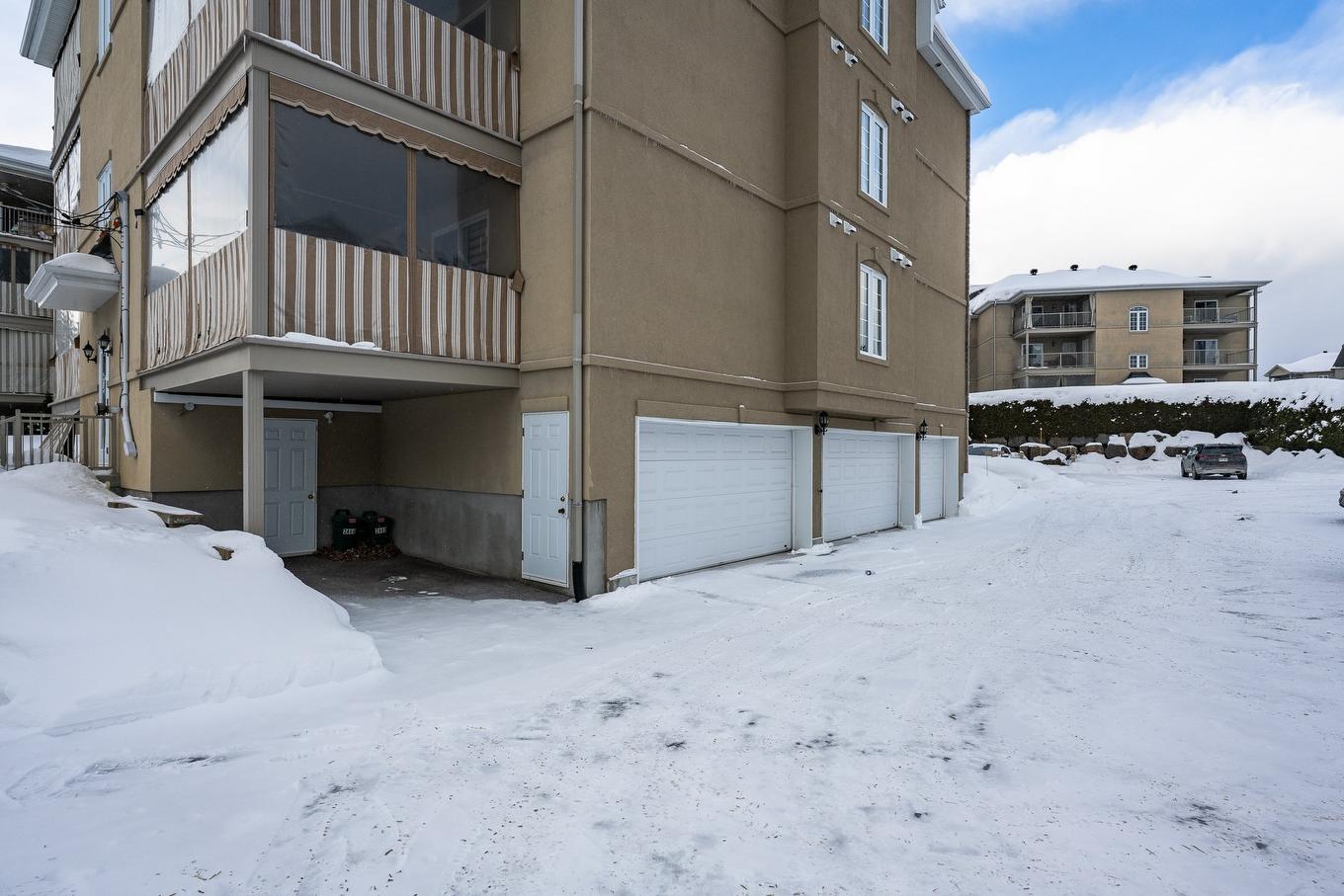 Garage - 401-2460 Boul. Lafontaine, Saint-Jérôme, QC - Outdoor With Exterior