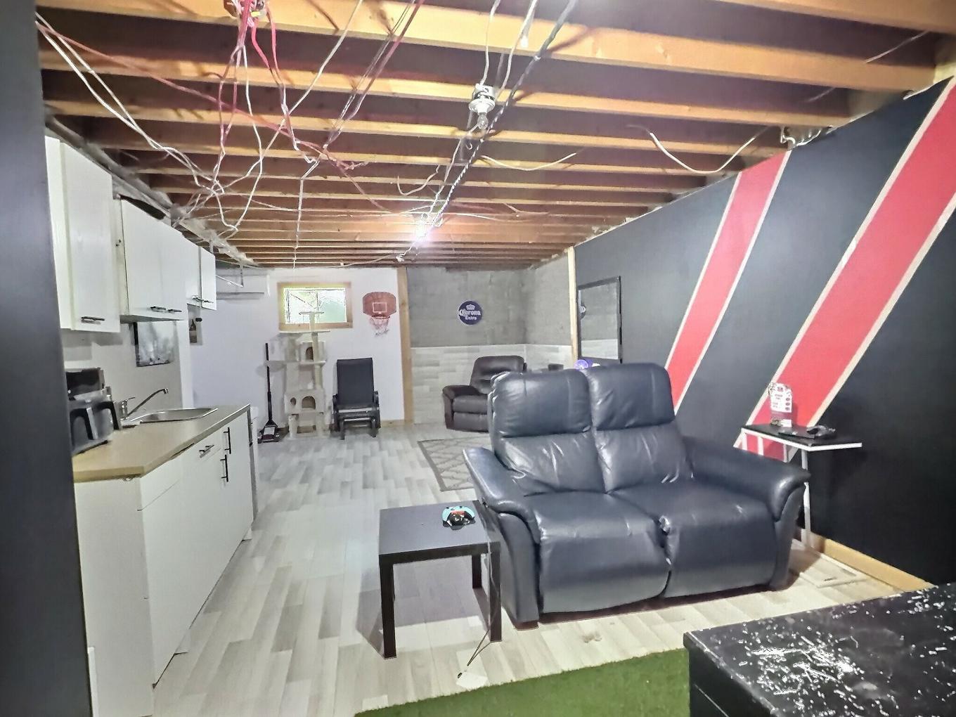 Salle familiale - 4 Rue Rivest O., Laverlochère-Angliers, QC - Indoor Photo Showing Basement