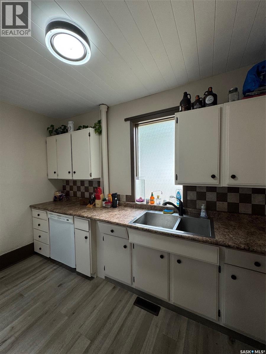 971 108Th Street, North Battleford, SK - Indoor Photo Showing Kitchen With Double Sink