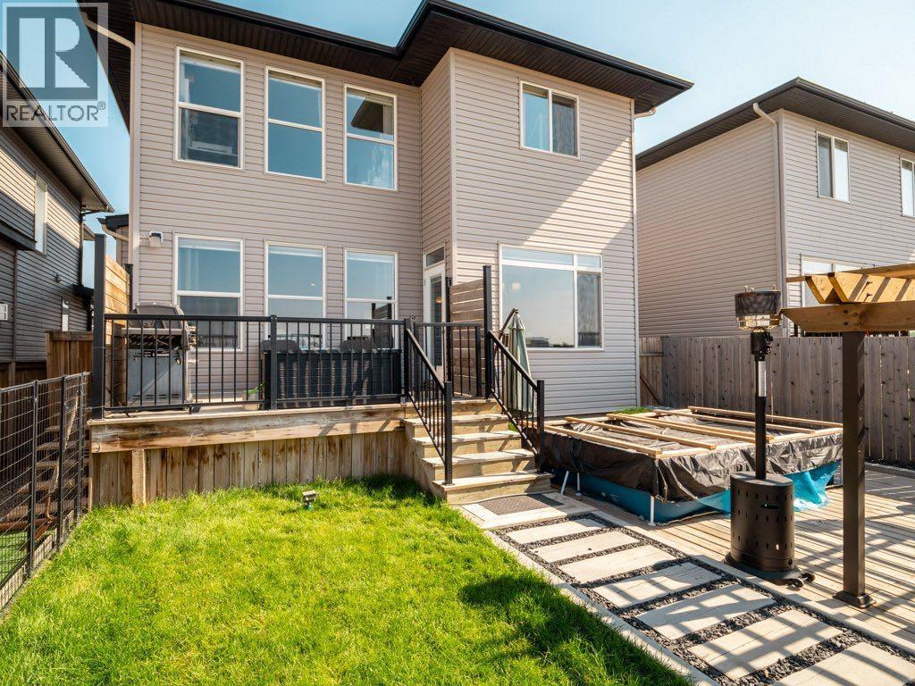 102 Blackwolf Bay N, Lethbridge, AB - Outdoor With Deck Patio Veranda