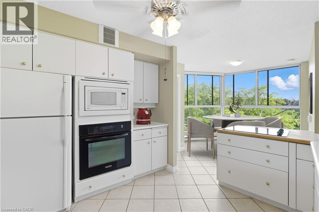 Virtually Staged - 20 Berkley Road Unit# 702, Cambridge, ON - Indoor Photo Showing Kitchen