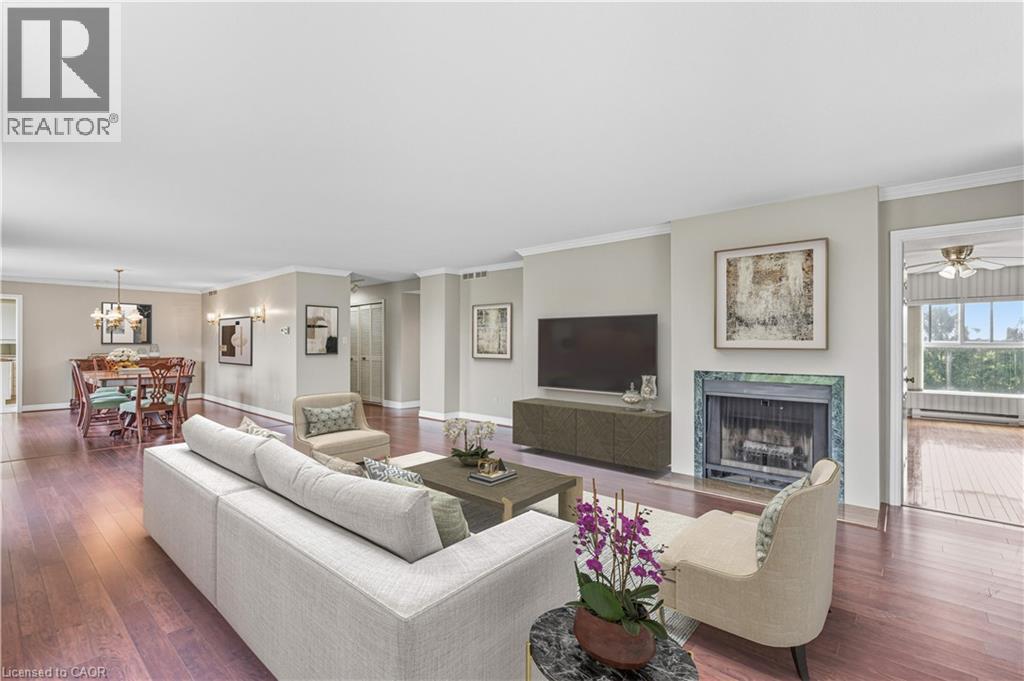 Virtually Staged - 20 Berkley Road Unit# 702, Cambridge, ON - Indoor Photo Showing Living Room With Fireplace