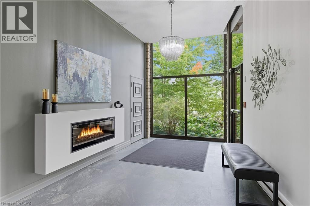 20 Berkley Road Unit# 702, Cambridge, ON - Indoor With Fireplace