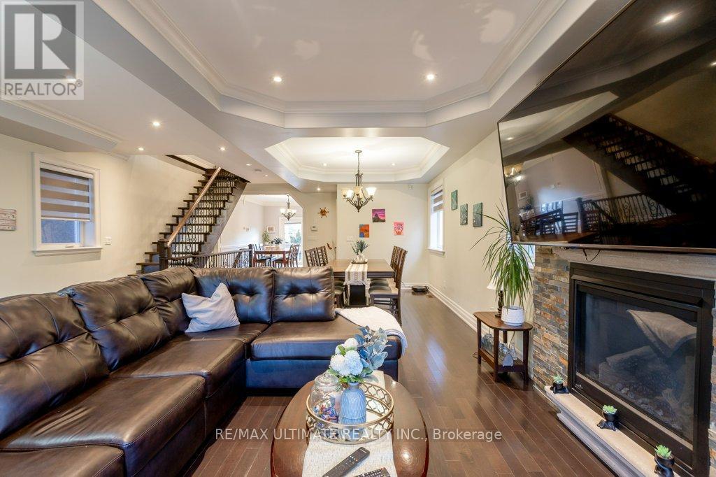 21 Thornton Avenue, Toronto, ON - Indoor Photo Showing Living Room With Fireplace