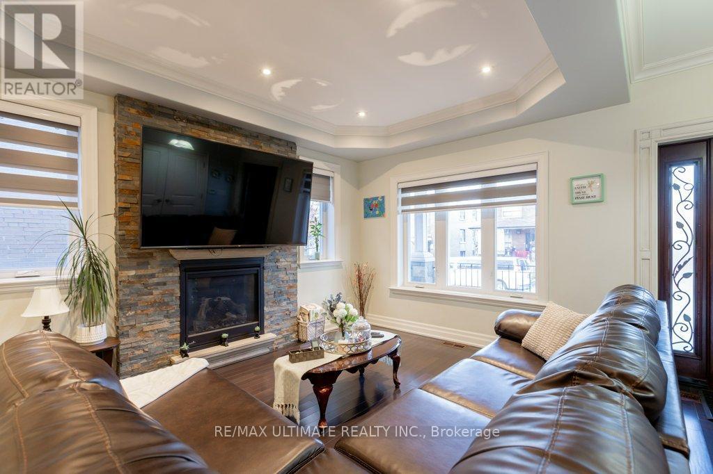 21 Thornton Avenue, Toronto, ON - Indoor Photo Showing Living Room With Fireplace