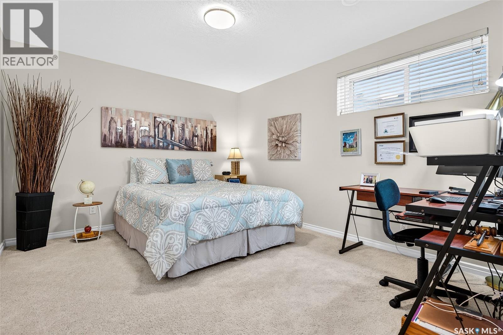 #4 21 Iris Drive, Moose Jaw, SK - Indoor Photo Showing Bedroom