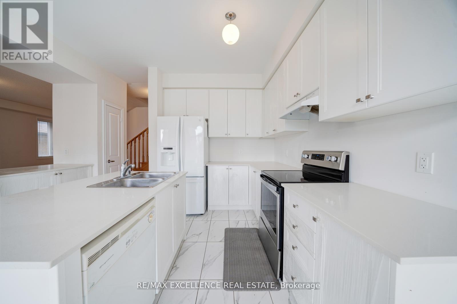 2085 Coppermine Street, Oshawa, ON - Indoor Photo Showing Kitchen With Double Sink