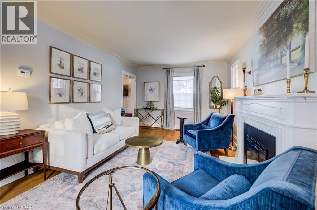 8 Lowrey Avenue S, Cambridge, ON - Indoor Photo Showing Living Room With Fireplace