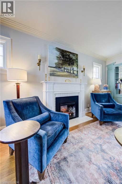 8 Lowrey Avenue S, Cambridge, ON - Indoor Photo Showing Living Room With Fireplace