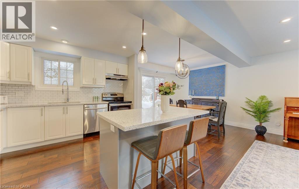 Access from garage for easy grocery unloading - 51 Nathaniel Crescent, Kitchener, ON - Indoor Photo Showing Kitchen With Upgraded Kitchen