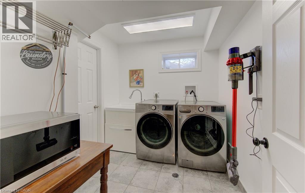 Bright and clean laundry room (basement) - 51 Nathaniel Crescent, Kitchener, ON - Indoor Photo Showing Laundry Room
