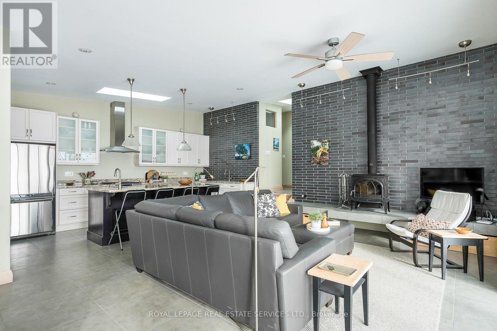 837177 4Th Line E, Mulmur, ON - Indoor Photo Showing Other Room With Fireplace