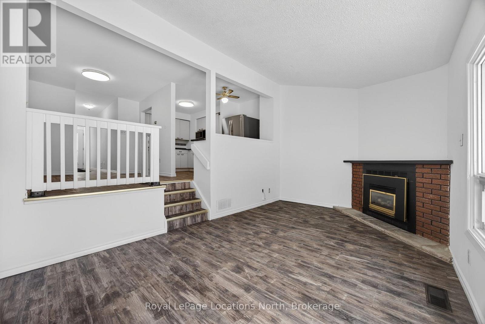 633 Tenth Street, Collingwood, ON - Indoor Photo Showing Other Room With Fireplace