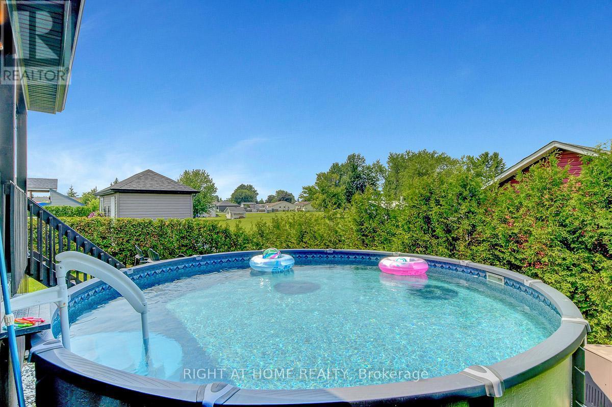 201 Versaille Street, Alfred And Plantagenet, ON - Outdoor With Above Ground Pool With Backyard