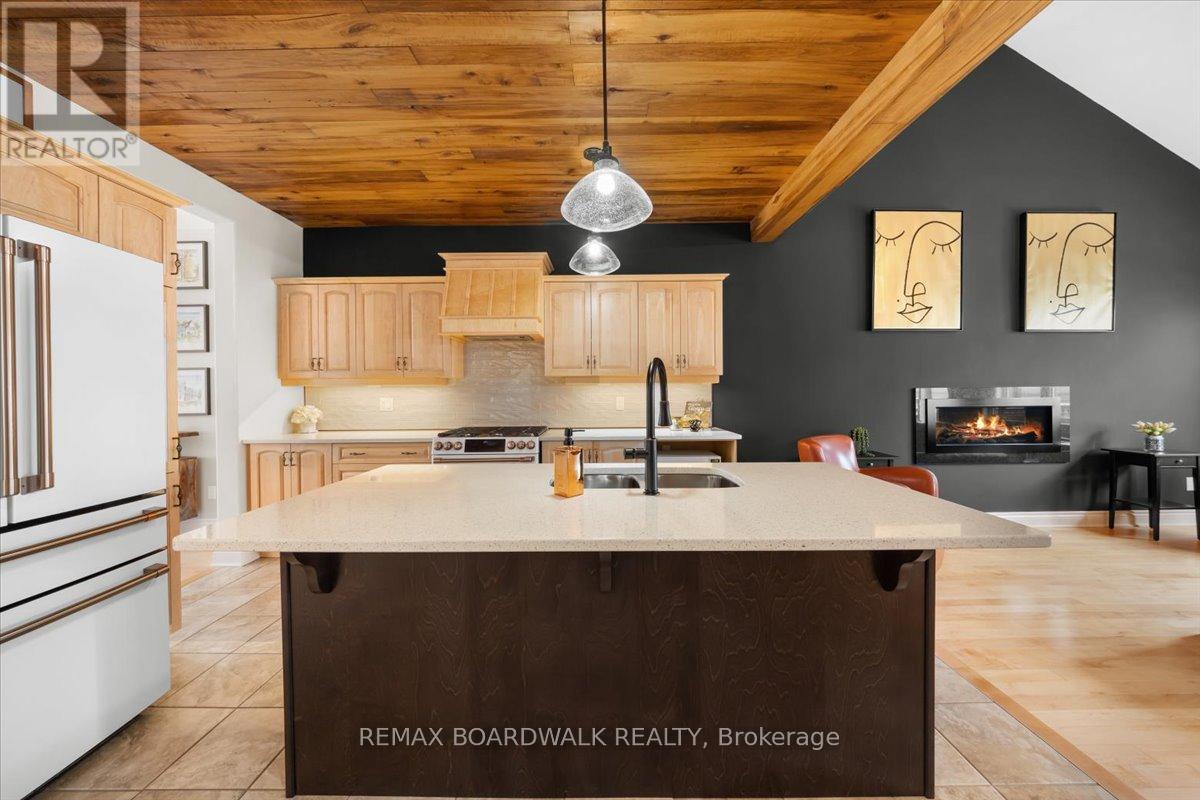 813 Platinum Street, Clarence-Rockland, ON - Indoor Photo Showing Kitchen With Fireplace With Double Sink