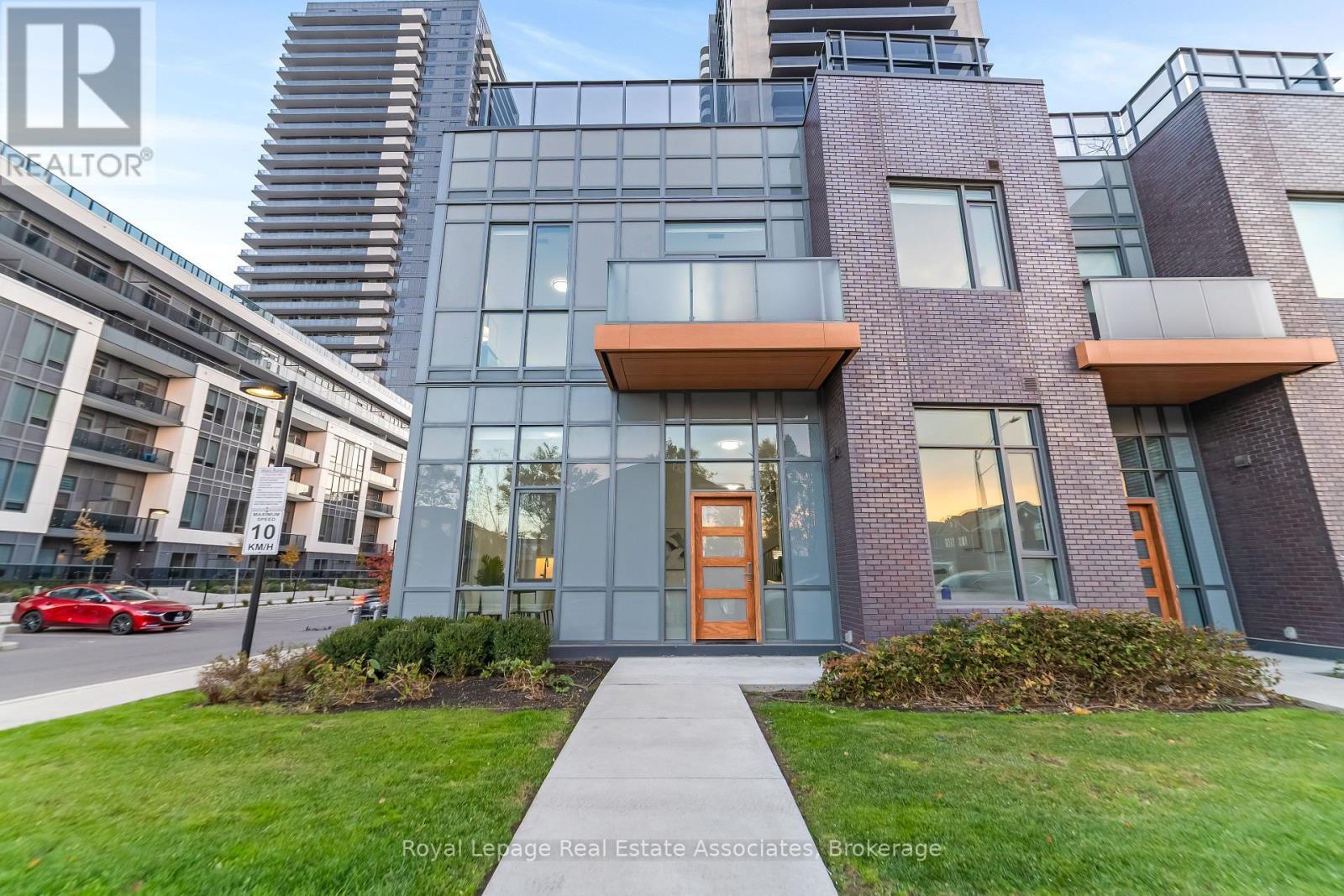 124 - 8 Nahani Way, Mississauga, ON - Outdoor With Balcony With Facade