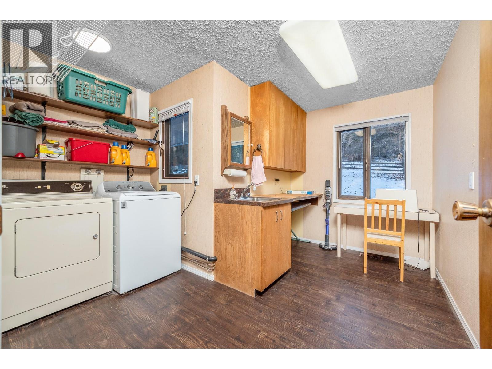 5860 Learmouth Road, Lavington, BC - Indoor Photo Showing Laundry Room