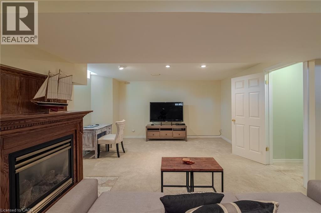 19 Somerset Drive Unit# 16, Port Dover, ON - Indoor Photo Showing Living Room With Fireplace