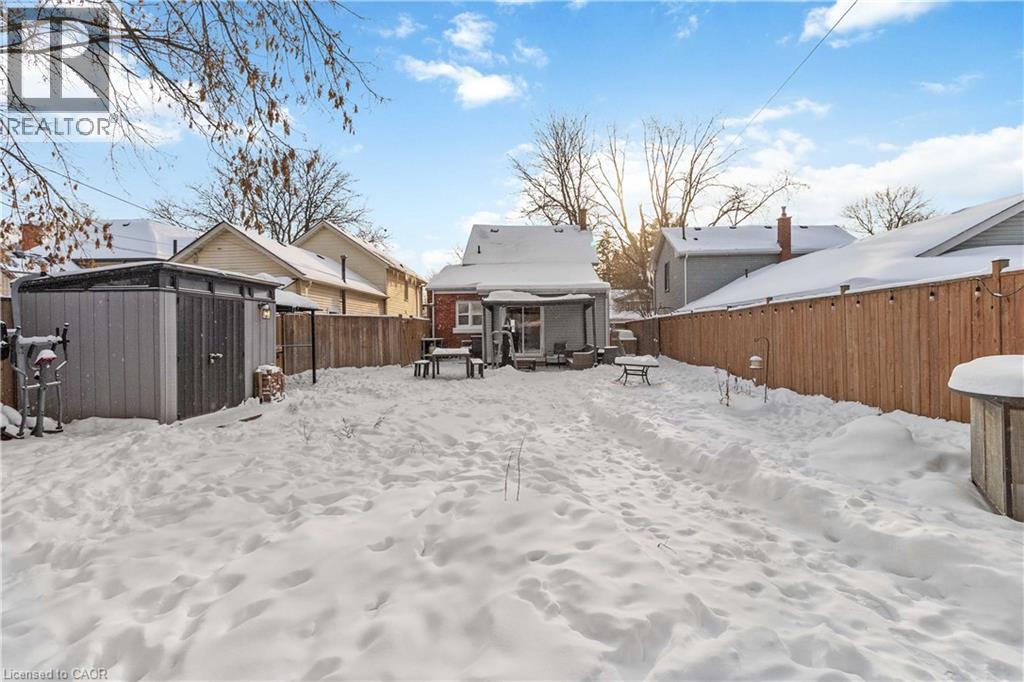 Large fenced yard with a shed - 112 Eagle Avenue, Brantford, ON - Outdoor