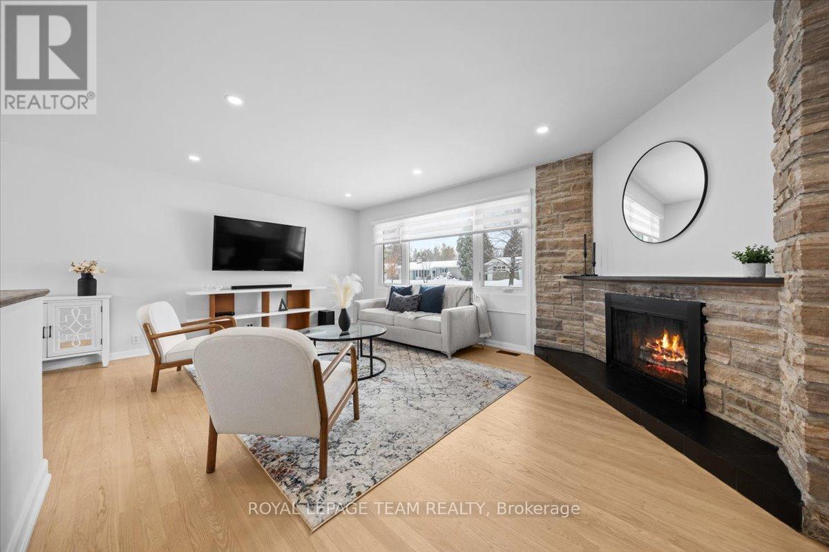 20 Whitburn Crescent, Ottawa, ON - Indoor Photo Showing Living Room With Fireplace