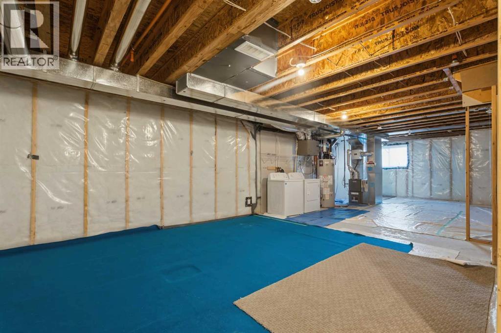 36 Howse Drive Ne, Calgary, AB - Indoor Photo Showing Basement