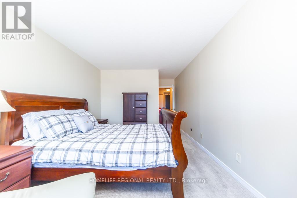 202 - 1665 Pickering Parkway, Pickering, ON - Indoor Photo Showing Bedroom