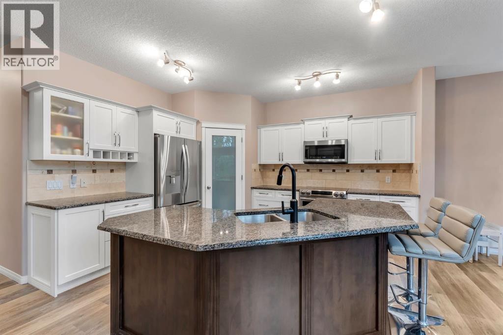 405 Kincora Drive Nw, Calgary, AB - Indoor Photo Showing Kitchen With Double Sink