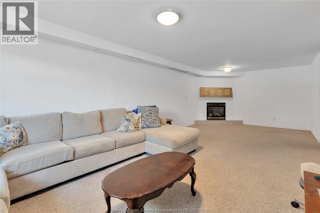 1414 Girard Drive, Lakeshore, ON - Indoor Photo Showing Living Room With Fireplace