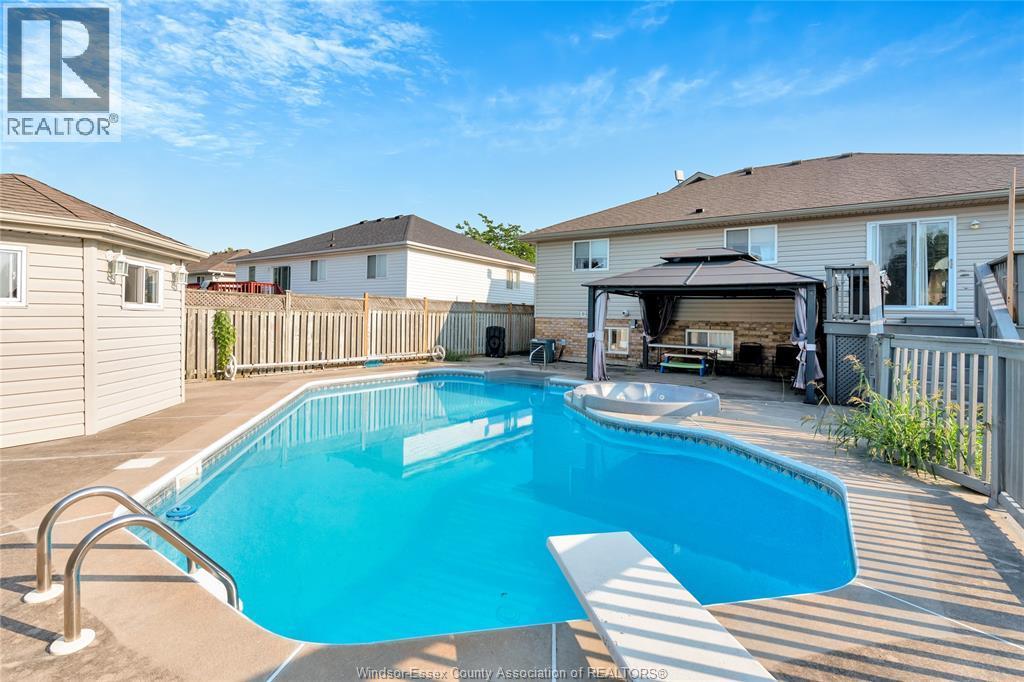 1414 Girard Drive, Lakeshore, ON - Outdoor With In Ground Pool With Deck Patio Veranda With Exterior