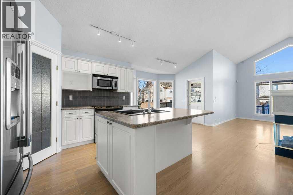 58 Chaparral Close Se, Calgary, AB - Indoor Photo Showing Kitchen With Double Sink With Upgraded Kitchen
