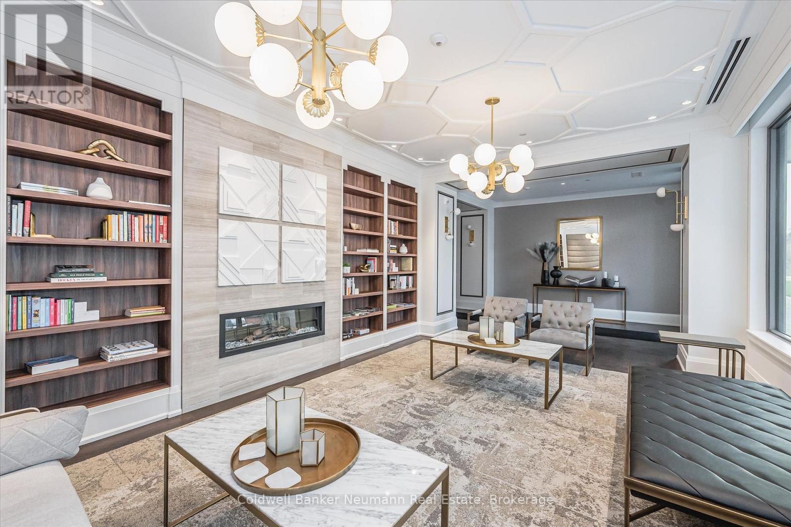 514 - 73 Arthur Street S, Guelph (St. Patrick'S Ward), ON - Indoor Photo Showing Living Room With Fireplace