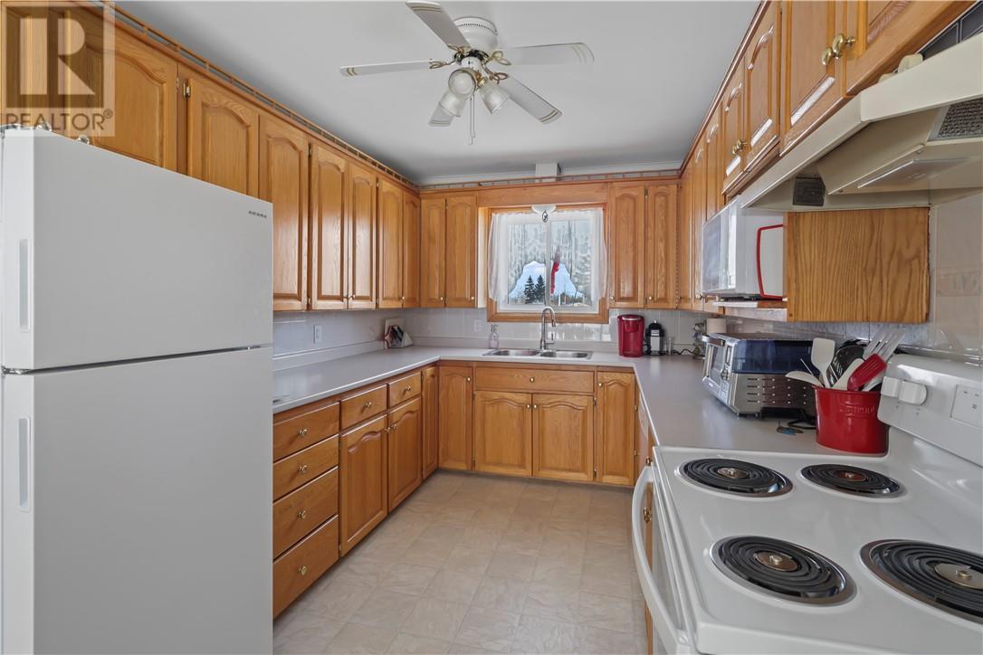 53 Walcot Street, Little Current, ON - Indoor Photo Showing Kitchen With Double Sink