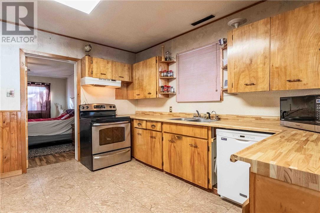 29 Kelly Street, Capreol, ON - Indoor Photo Showing Kitchen With Double Sink