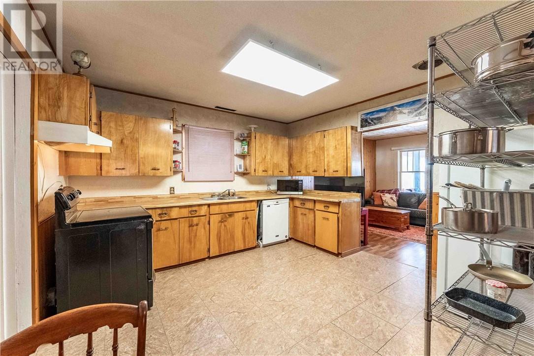 29 Kelly Street, Capreol, ON - Indoor Photo Showing Kitchen With Double Sink