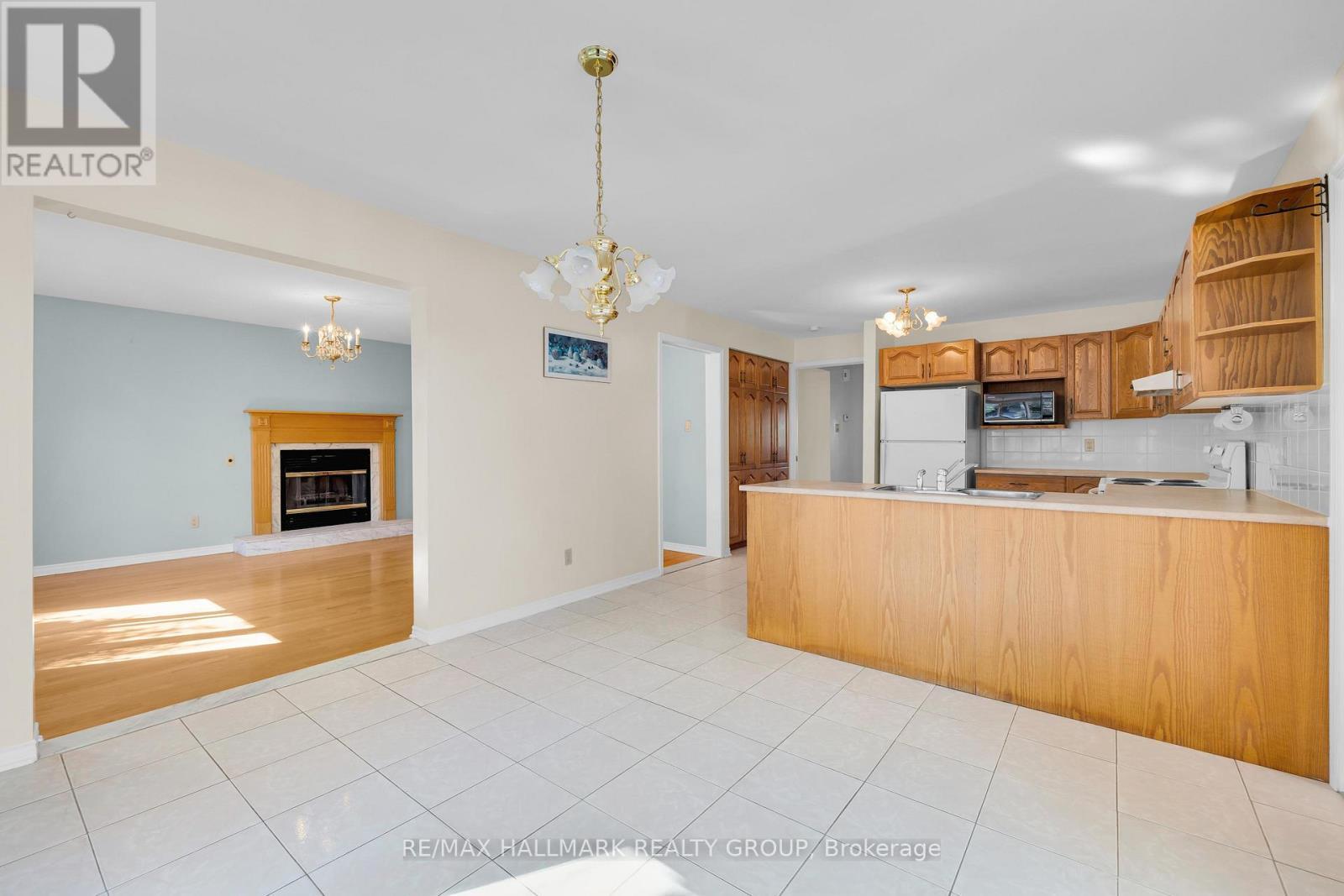 1396 Larose Avenue, Ottawa, ON - Indoor Photo Showing Kitchen With Fireplace