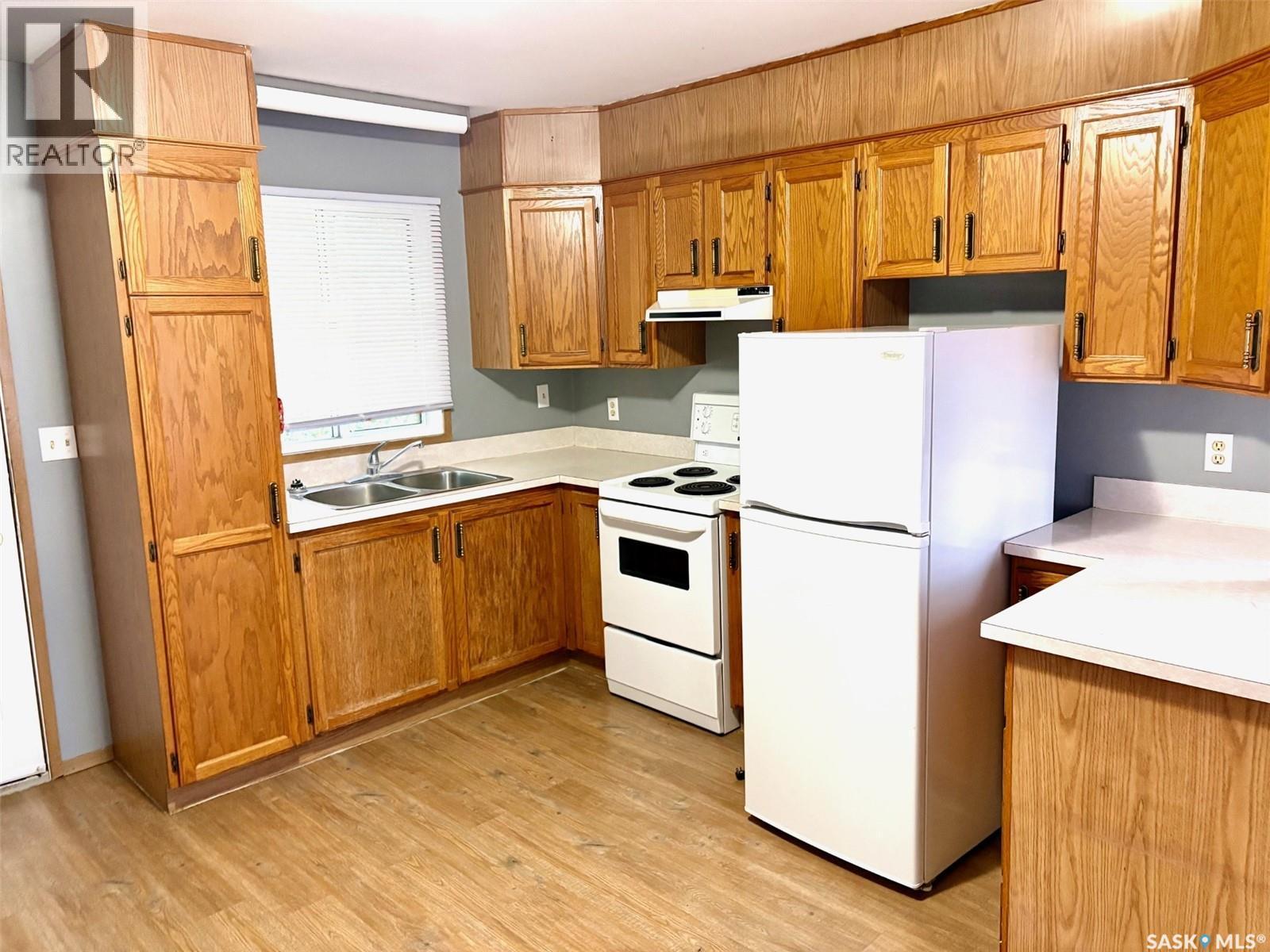322 James Street, Esterhazy, SK - Indoor Photo Showing Kitchen With Double Sink
