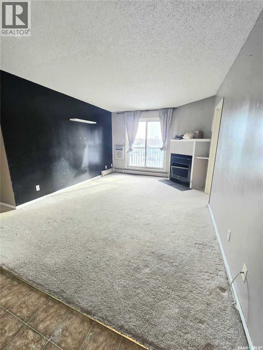 318 3308 33Rd Street W, Saskatoon, SK - Indoor With Fireplace