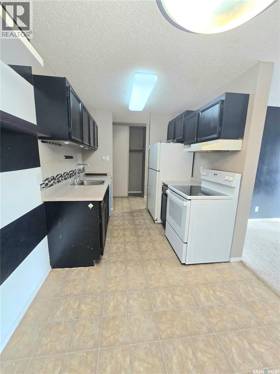 318 3308 33Rd Street W, Saskatoon, SK - Indoor Photo Showing Laundry Room