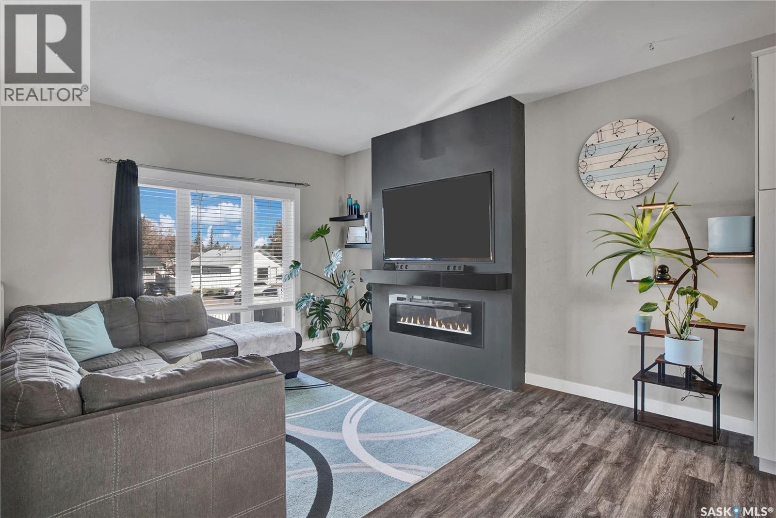 214 4Th Street, Hague, SK - Indoor Photo Showing Living Room With Fireplace