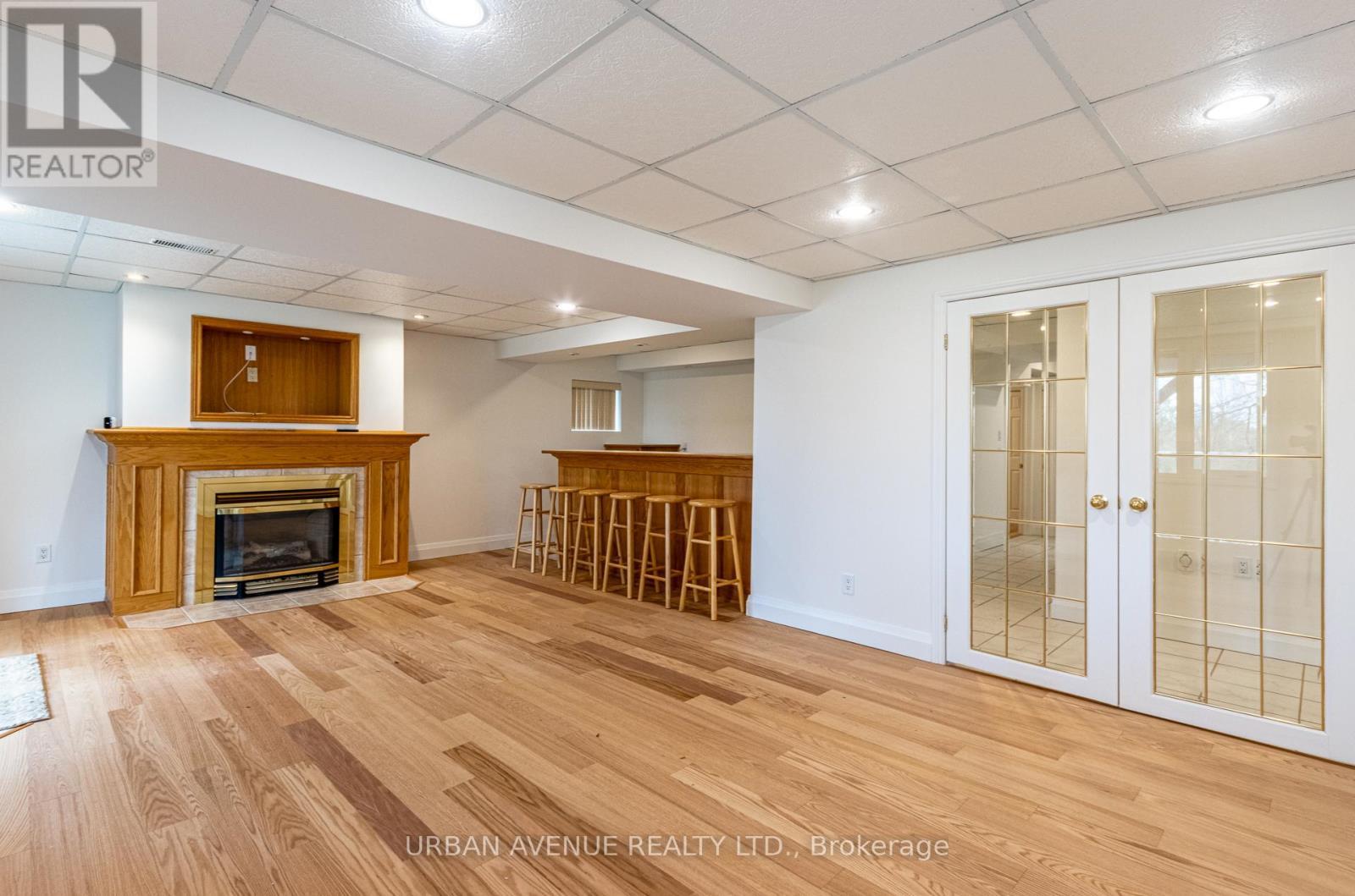 Basement Recreation Room with Fireplace - 363 Waterbury Crescent, Scugog, ON - Indoor With Fireplace