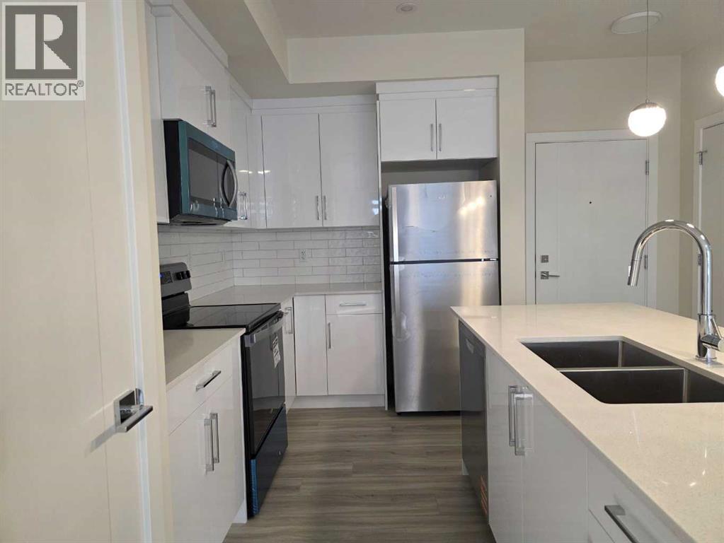 2220, 15 Skyview Point Crescent, Calgary, AB - Indoor Photo Showing Kitchen With Stainless Steel Kitchen With Double Sink With Upgraded Kitchen