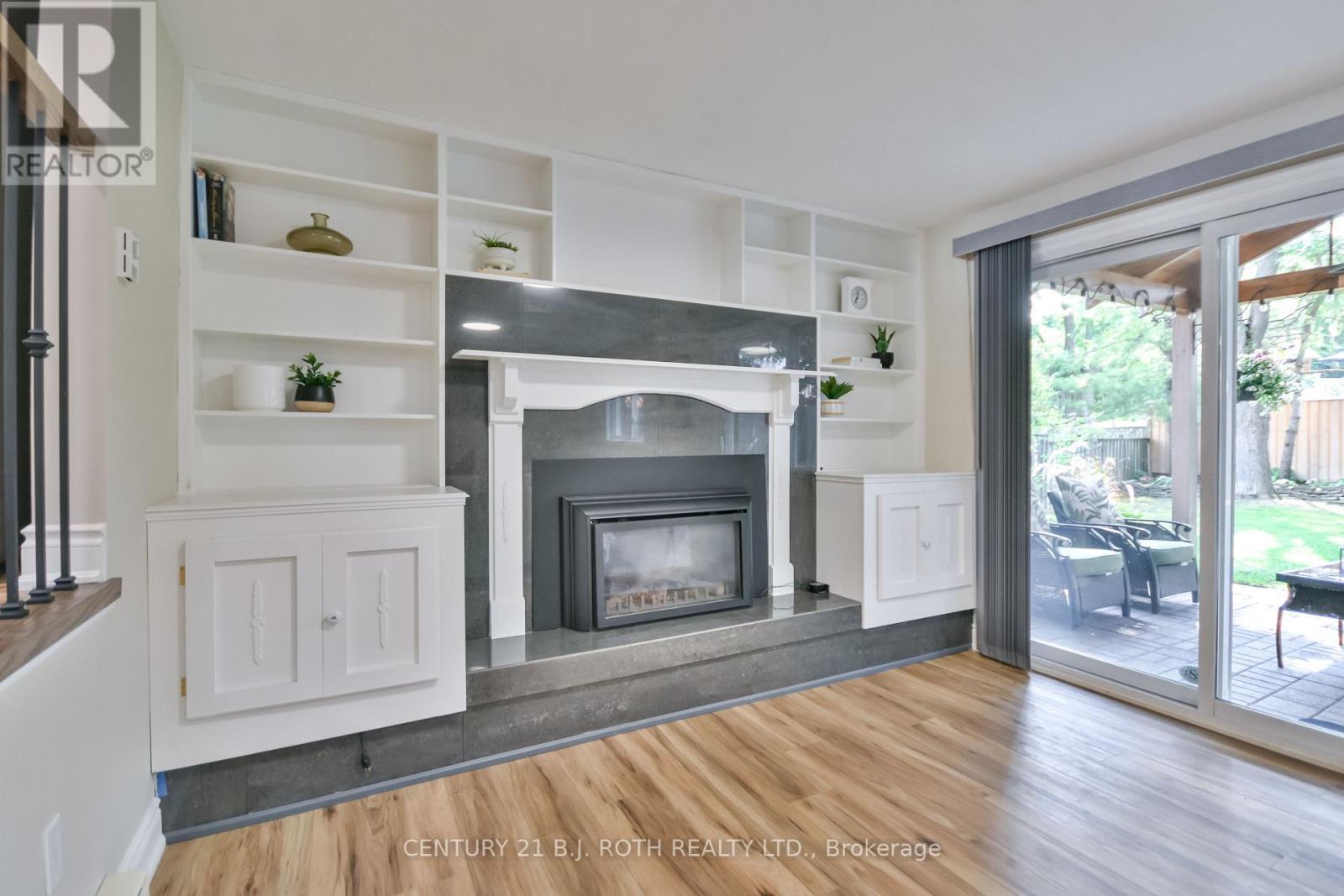 49 Ridgeway Avenue, Barrie, ON - Indoor Photo Showing Living Room With Fireplace