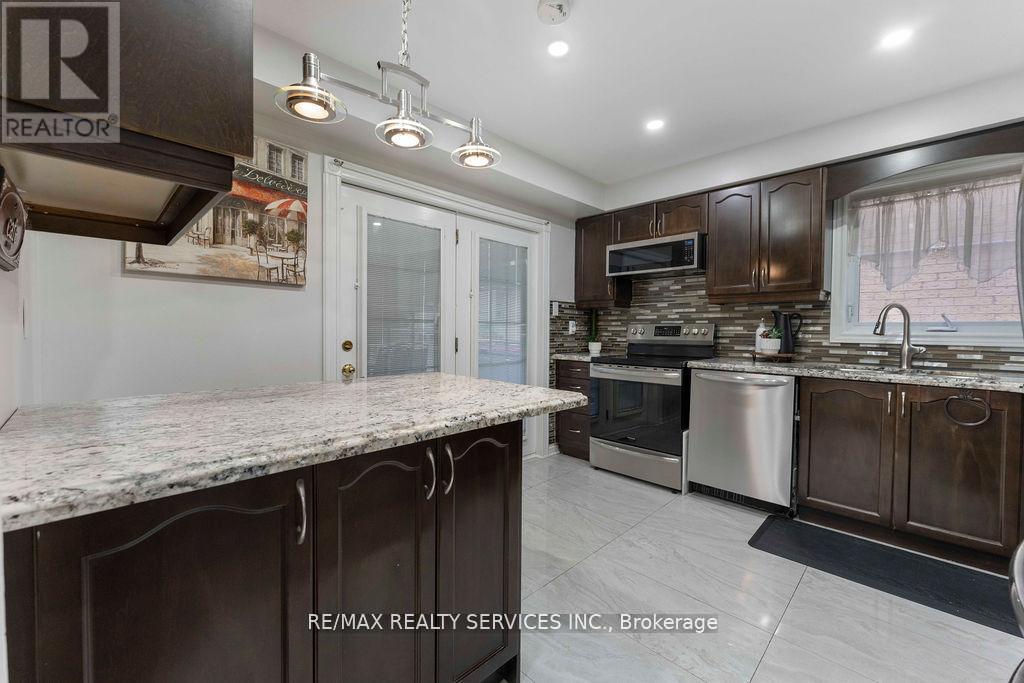 12 Nuttall Street, Brampton, ON - Indoor Photo Showing Kitchen With Stainless Steel Kitchen With Double Sink